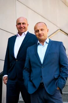 Restaurant manager smiling at front counter