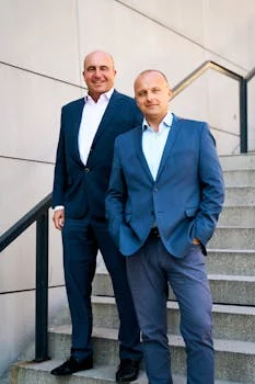 Head chef preparing wing sauces in kitchen